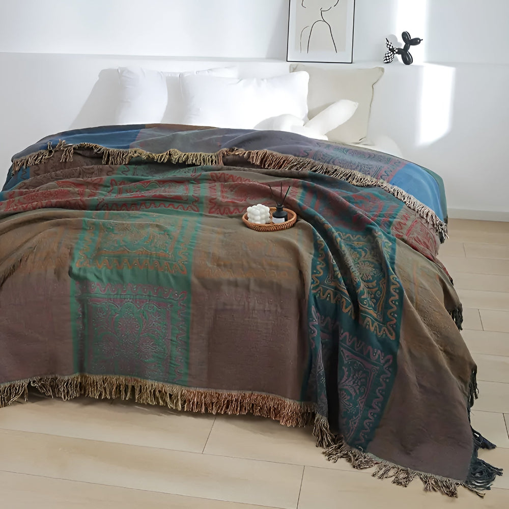 Plaid à pompons mandala bohème pour une décoration intérieure douillette