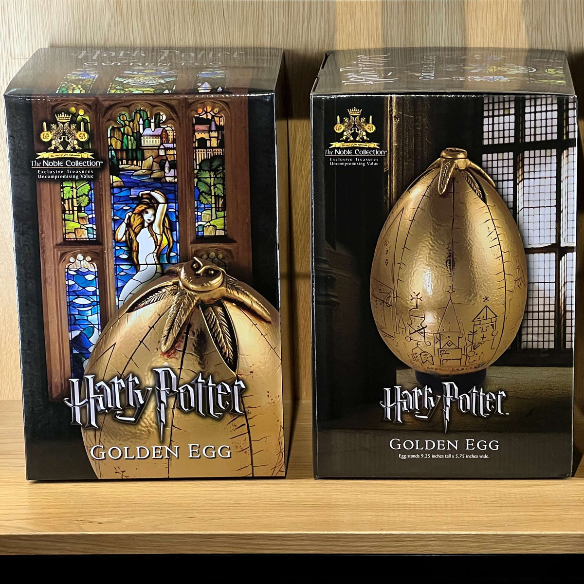 Harry-Potter-Replik eines goldenen Eis mit Präsentationsständer - Kunstharz
