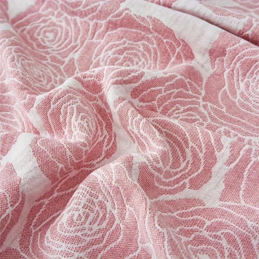 Plaid en coton rose doux pour une décoration intérieure confortable