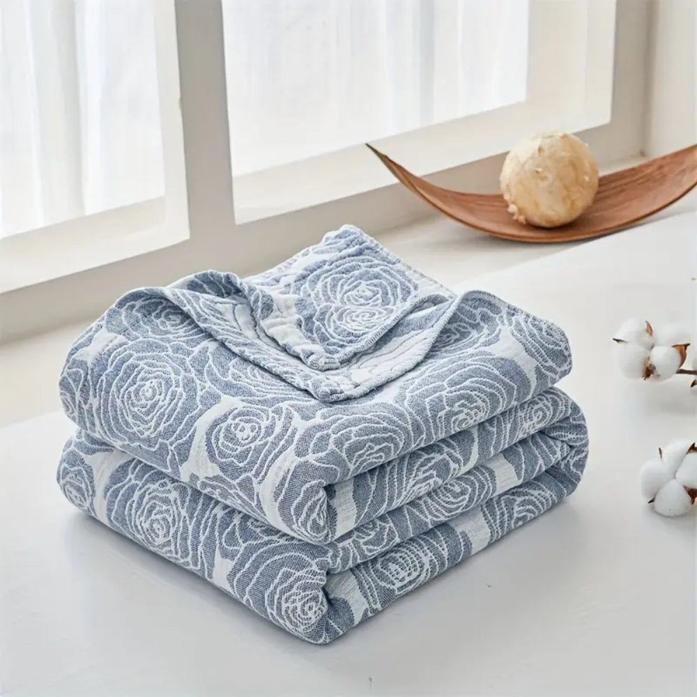Plaid en coton rose doux pour une décoration intérieure confortable