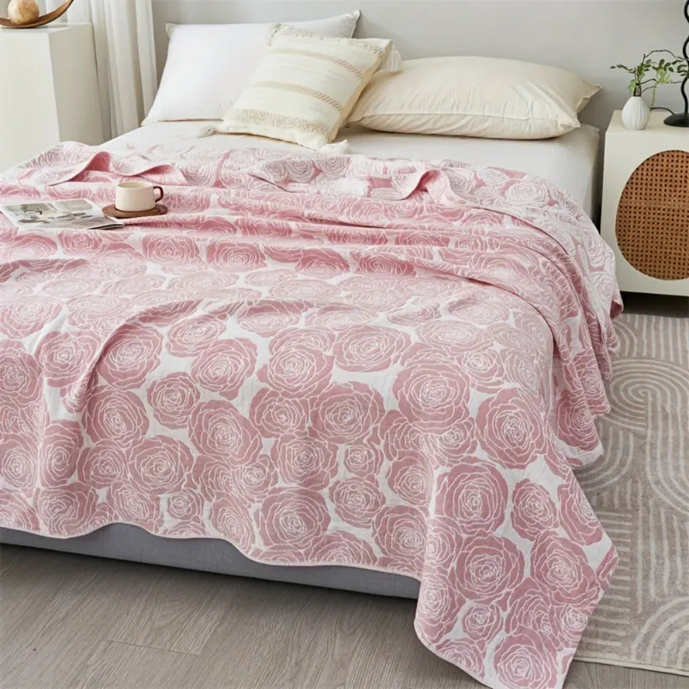 Plaid en coton rose doux pour une décoration intérieure confortable