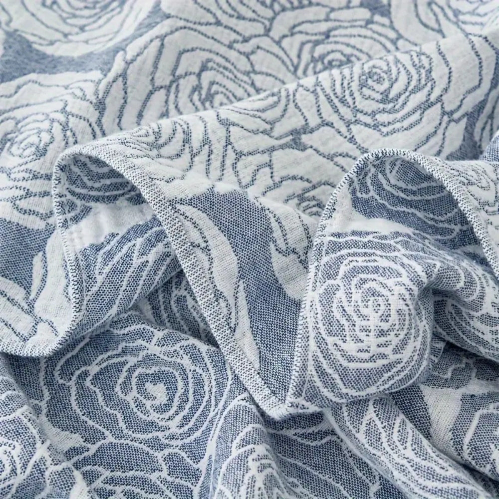 Plaid en coton rose doux pour une décoration intérieure confortable