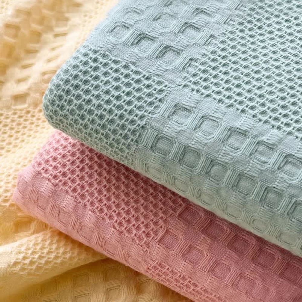 Gemütliche Blush-Waffel-Karo-Wurfdecke für Wohnkultur