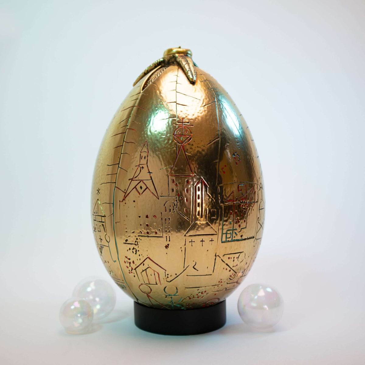 Harry-Potter-Replik eines goldenen Eis mit Präsentationsständer - Kunstharz